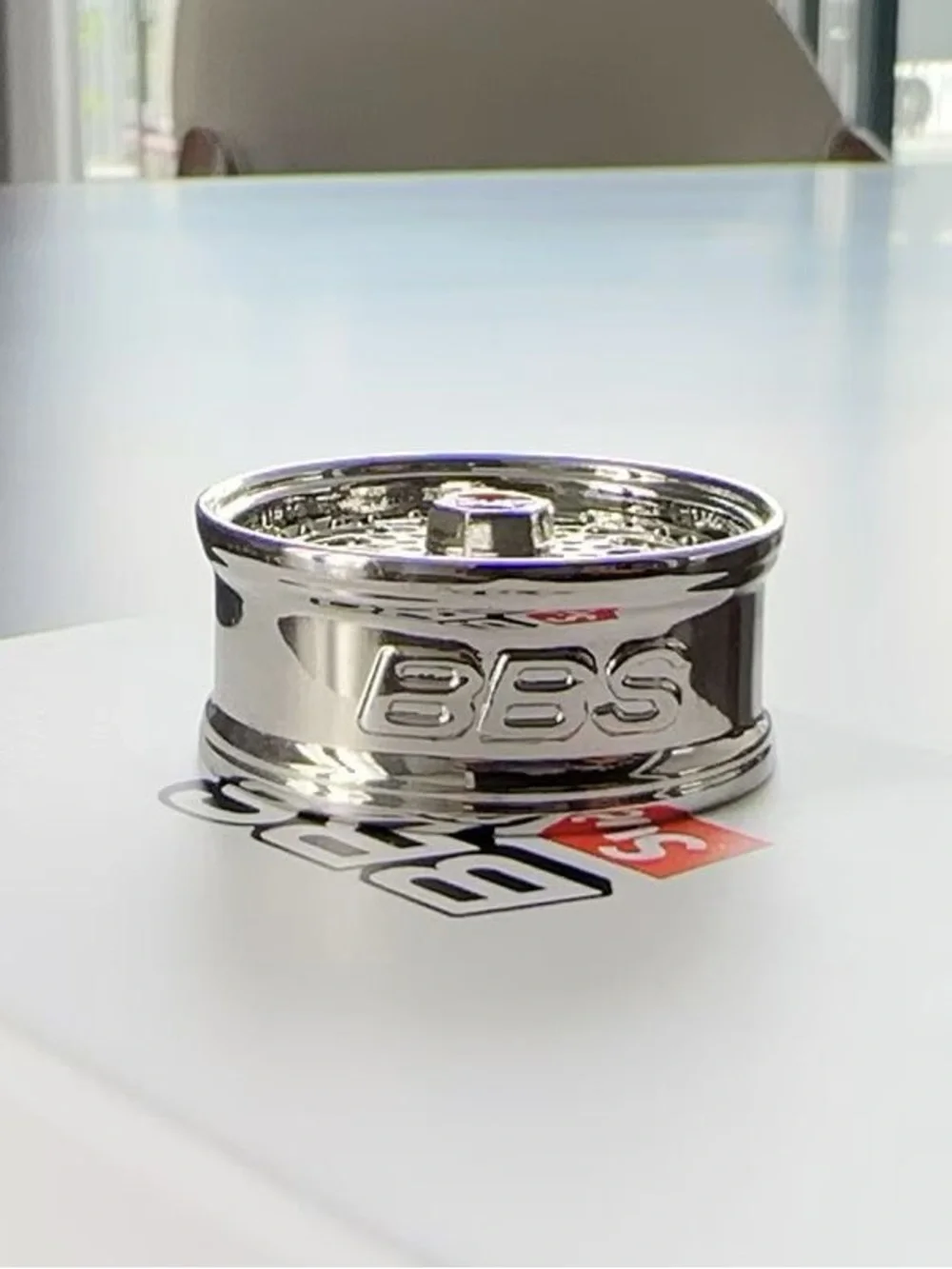 Supreme Silver Wheel Keychain with Red Logo Center